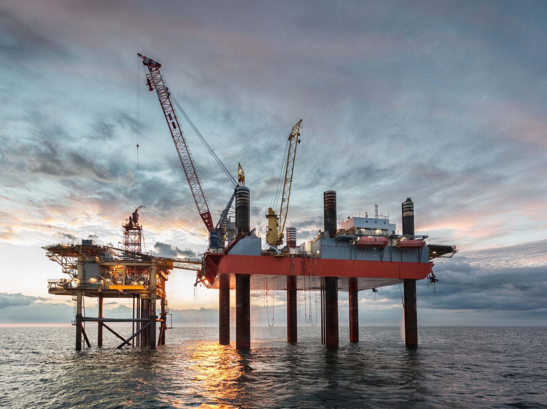 A jack-up rig performs work-over operations on a gas well