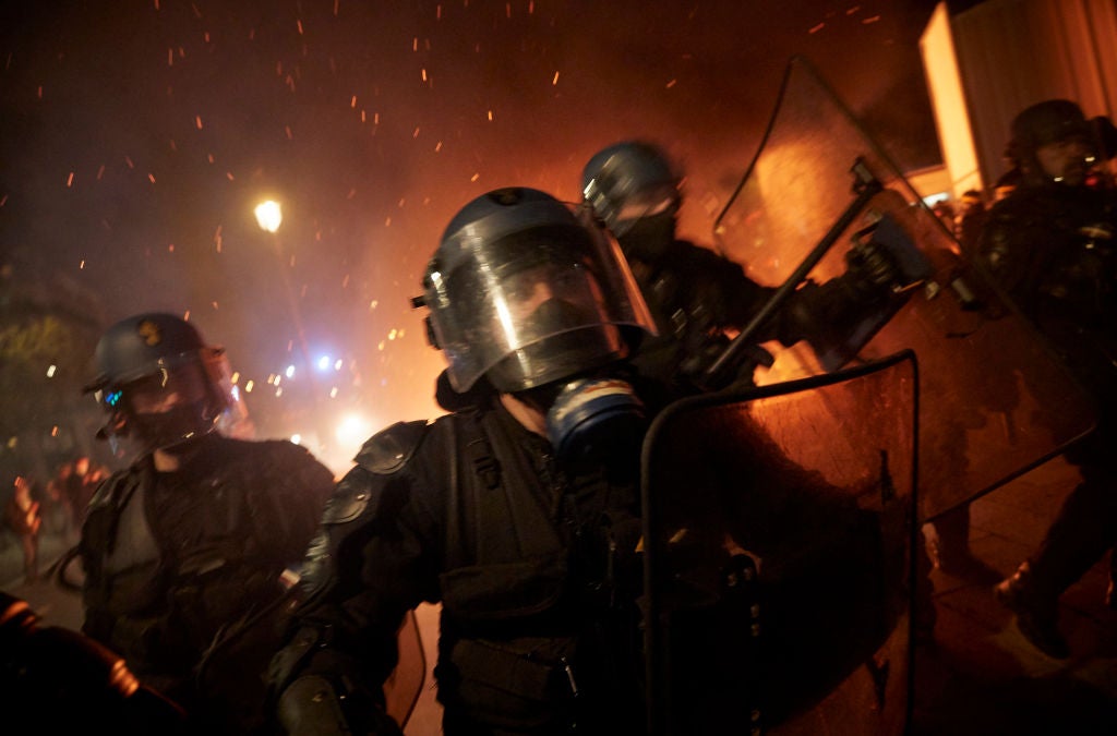 French riot police charge towards protesters at Place de la Bastille as demonstrations against the French government’s global security law turn violent