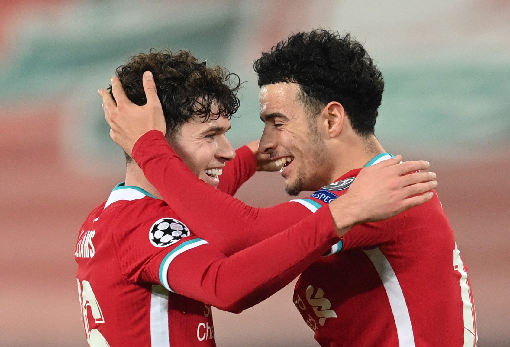 Curtis Jones (right) celebrates with Neco Williams after putting Liverpool in front of Ajax