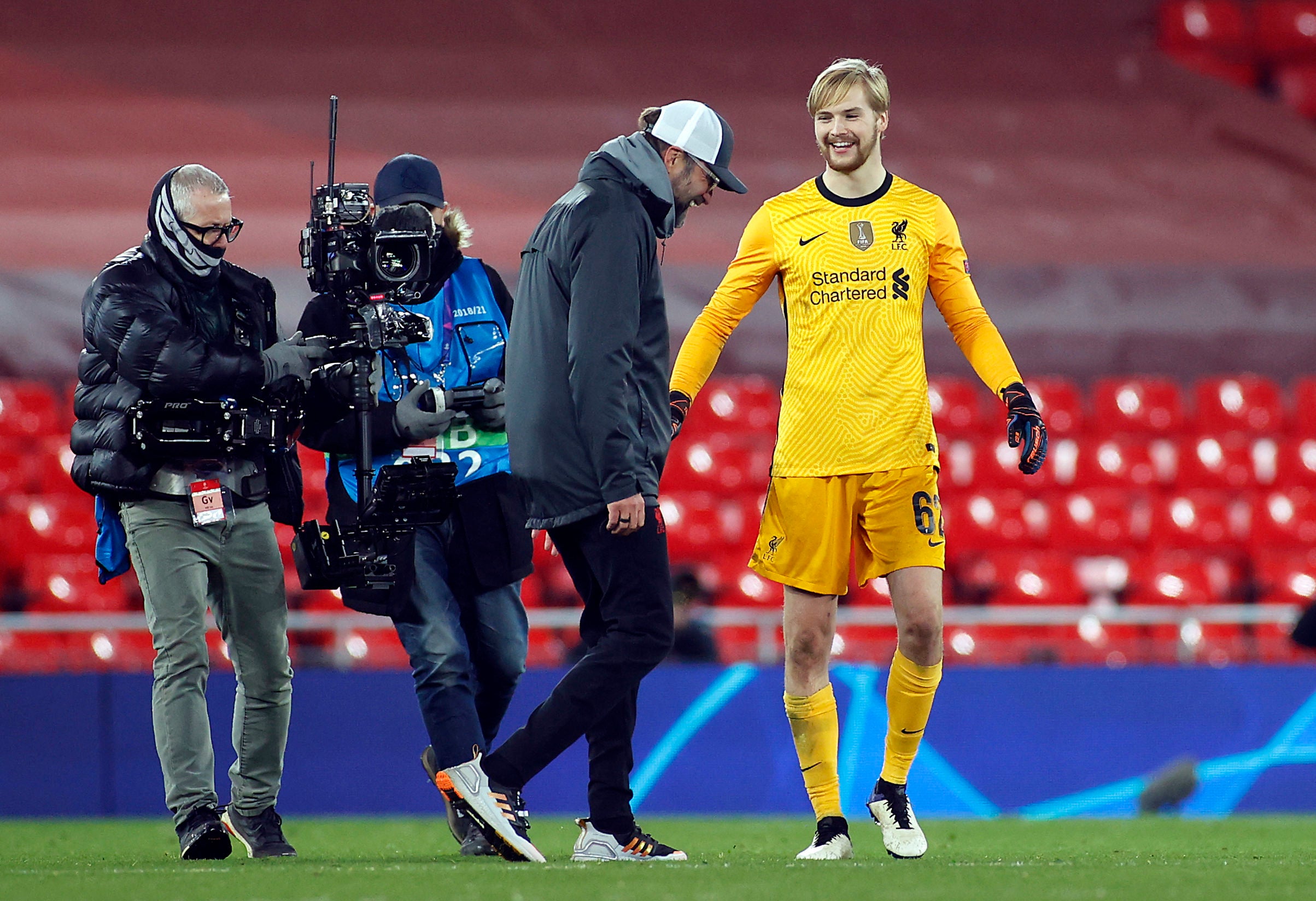 Jurgen Klopp goes to congratulate his young goalkeeper Caoimhin Kelleher