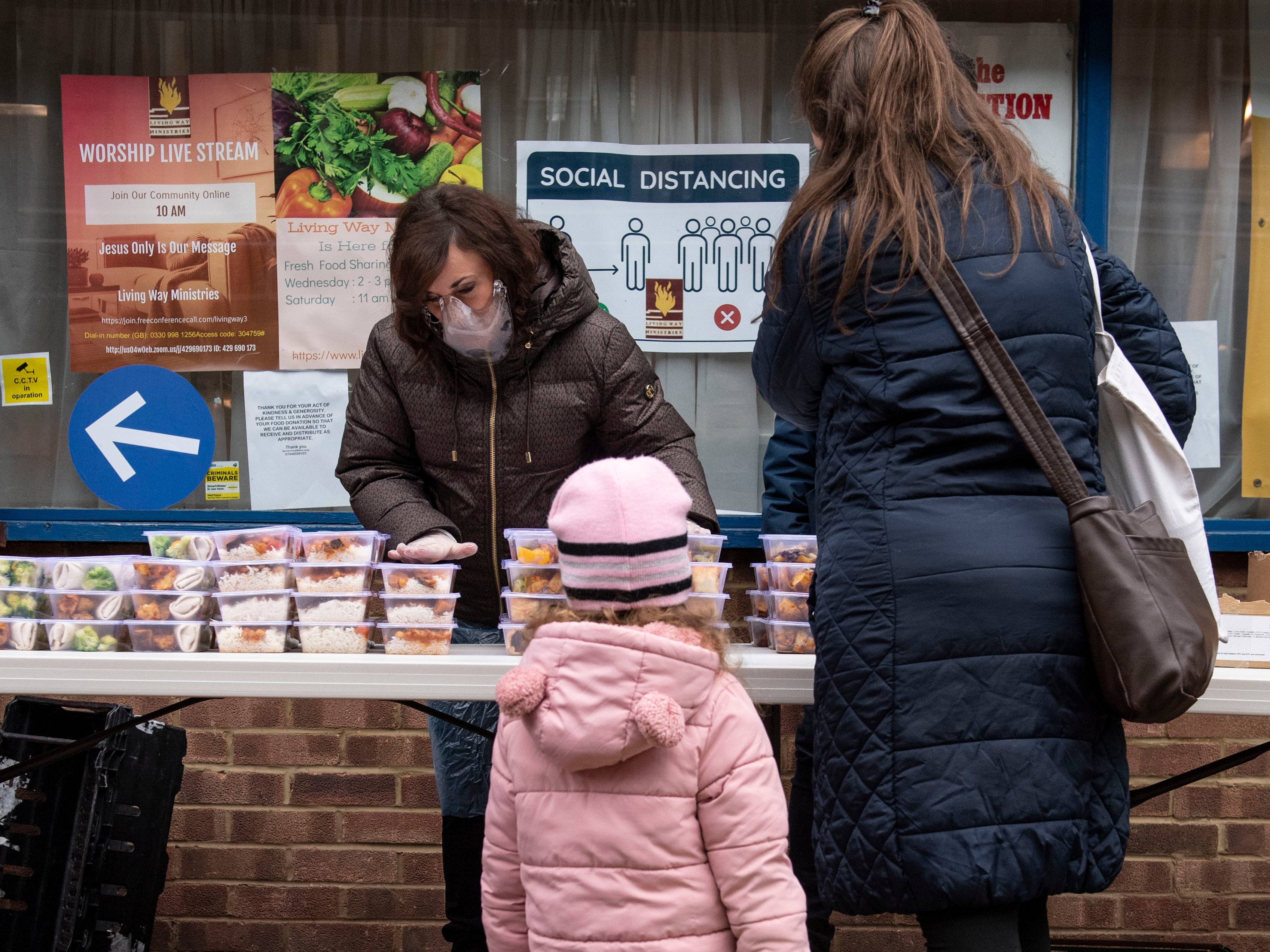 Shirley Ballas, head judge on Strictly Come Dancing, distributes food to people in North West London as part of our campaign