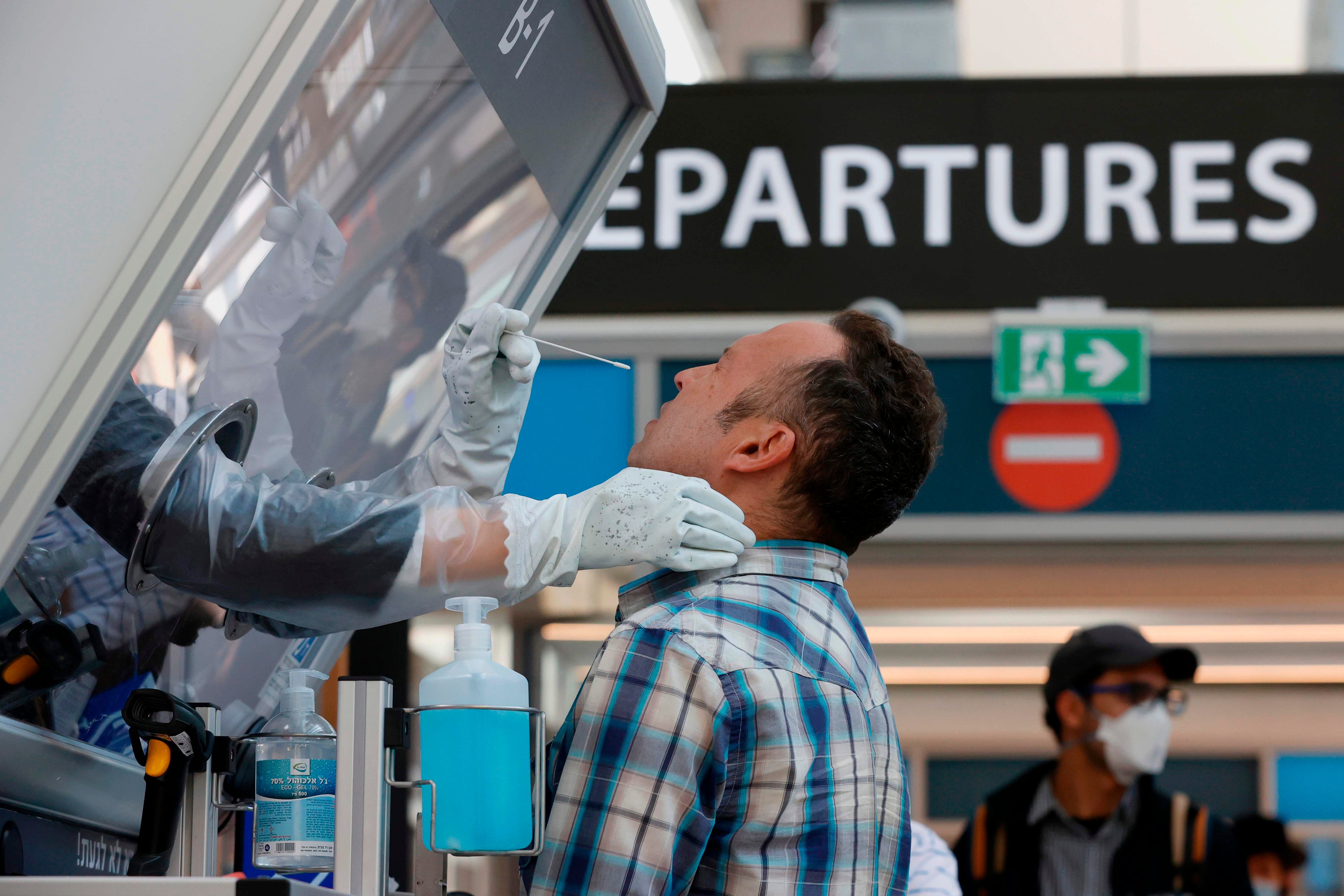 A man is tested for coronavirus at Israel’s Ben Gurion International Airport