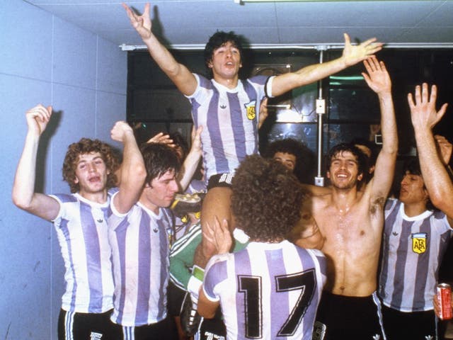 Diego Maradona celebrates with teammates