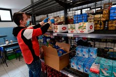 Italians in richest city turn to food banks as Covid cripples economy