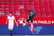 Real Madrid earn scrappy victory at Sevilla to boost title hopes