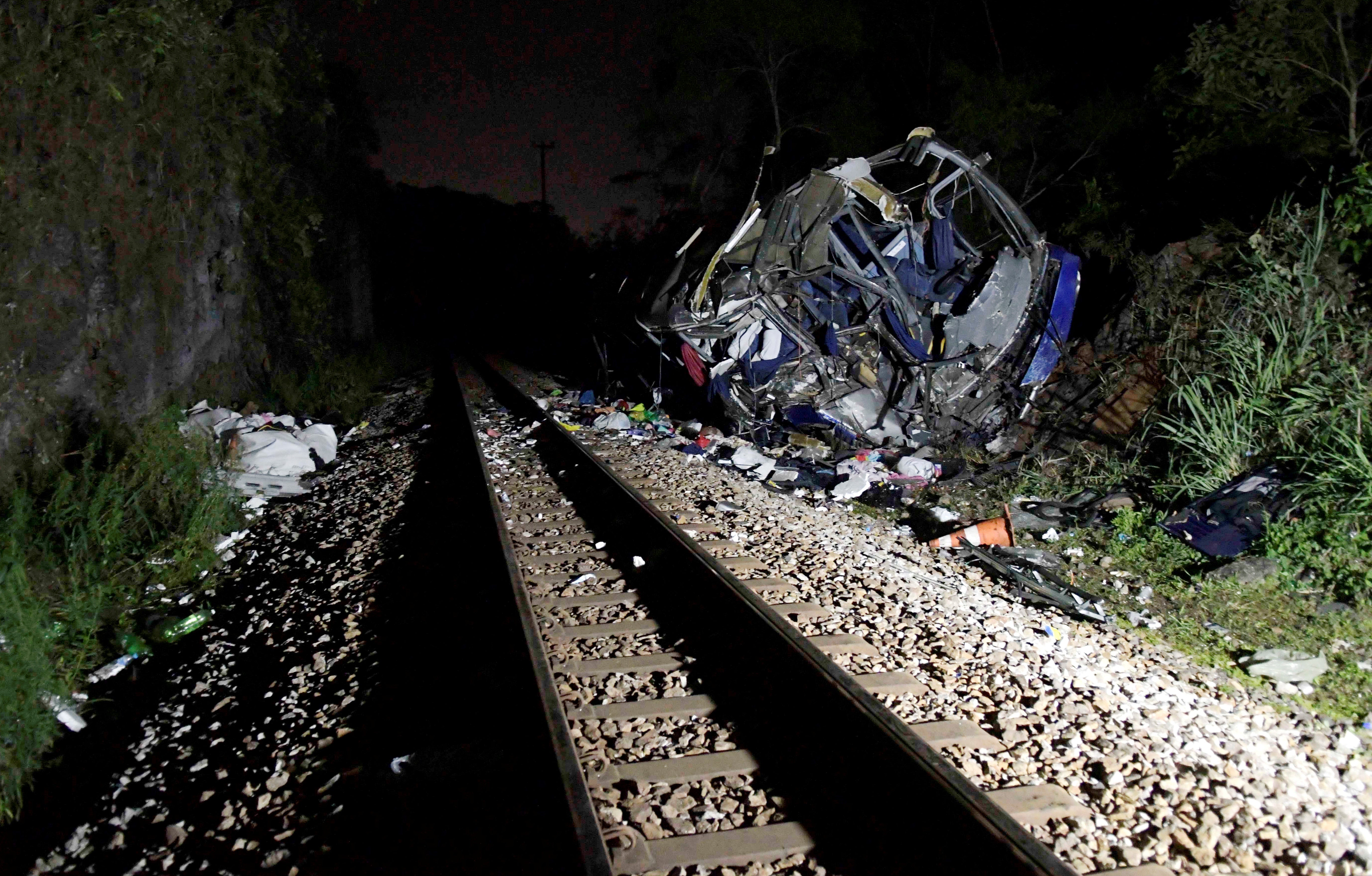 Bus fell 45 feet from overpass on to train tracks