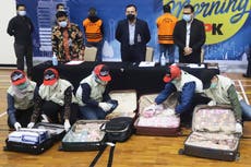 Indonesia minister turns himself in for COVID-19 aid graft