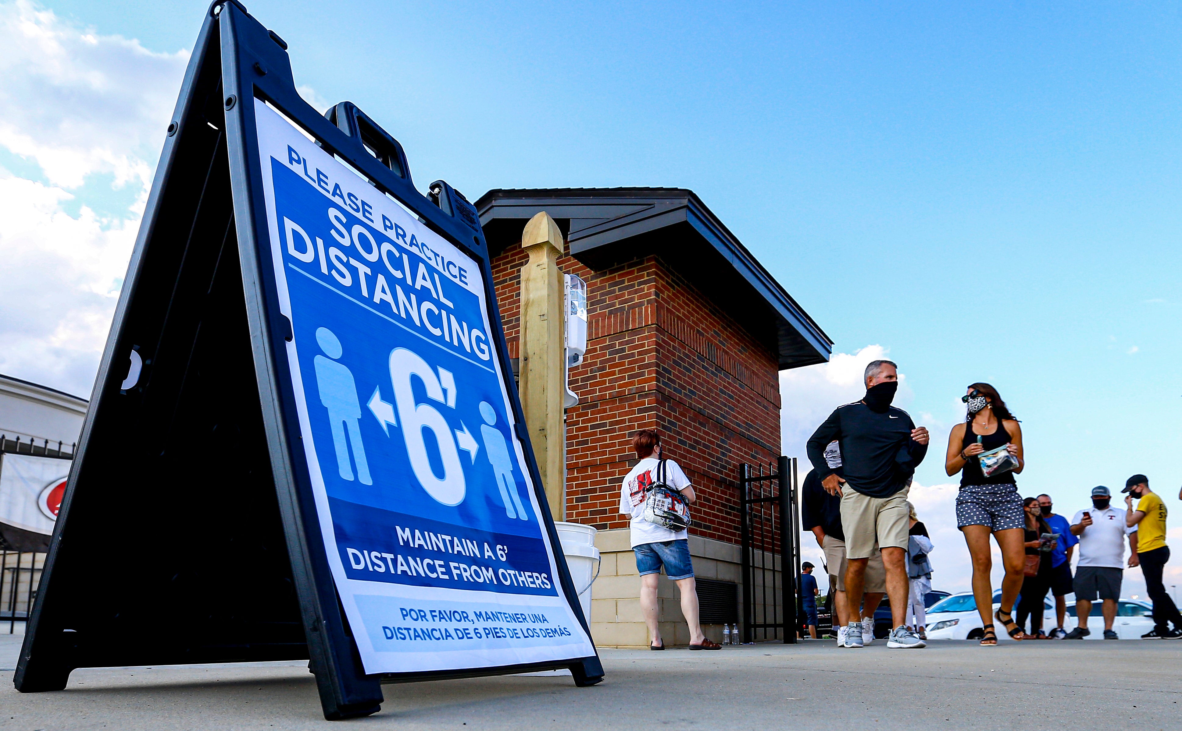 Fans follow guidelines for Covid-19 as they attend a football game between Thompson and Oxford in Alabaster, Alabama