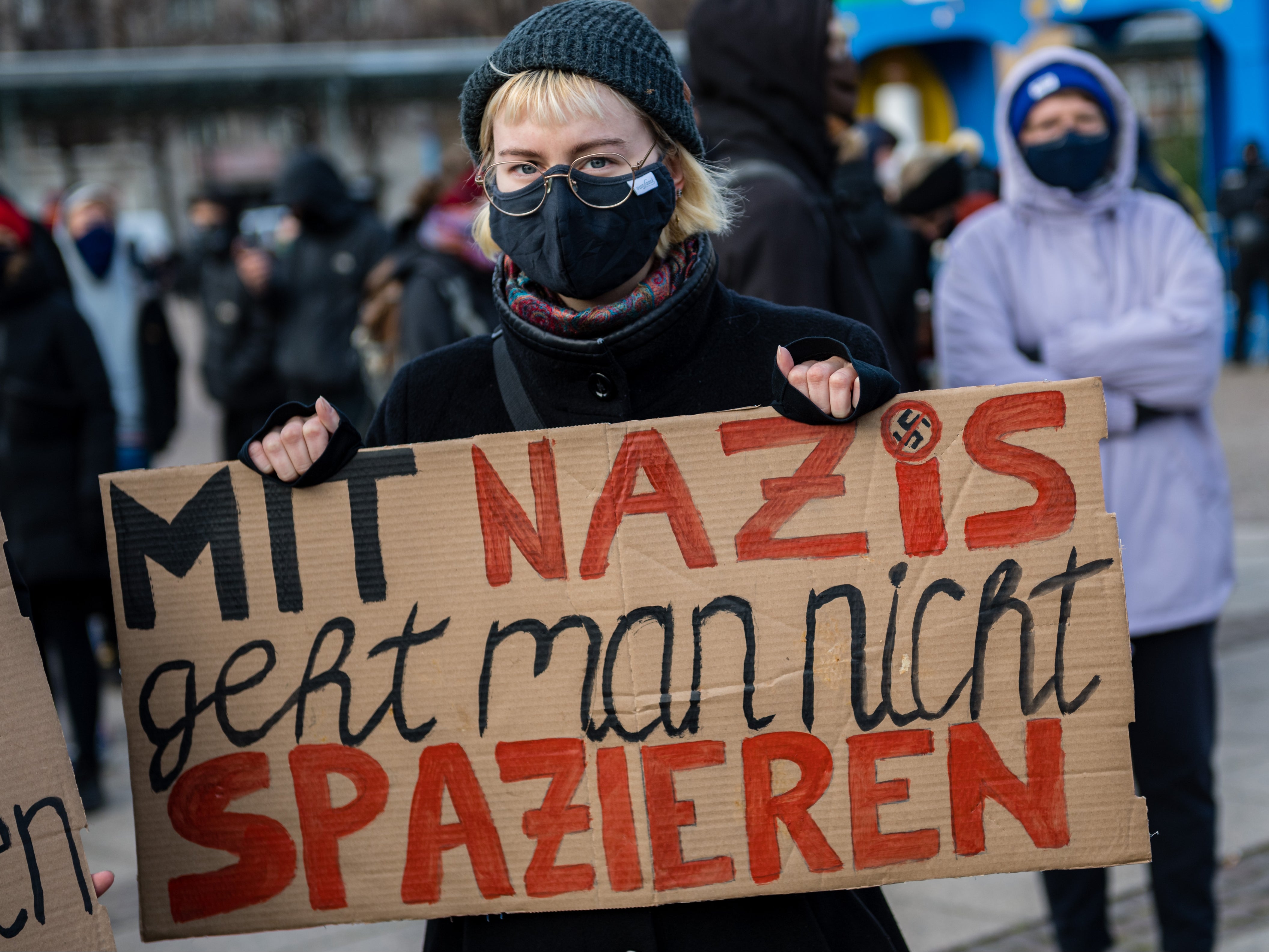 A woman counter protesting against a neo-Nazi-led anti-lockdown demonstration in Leipzig last month