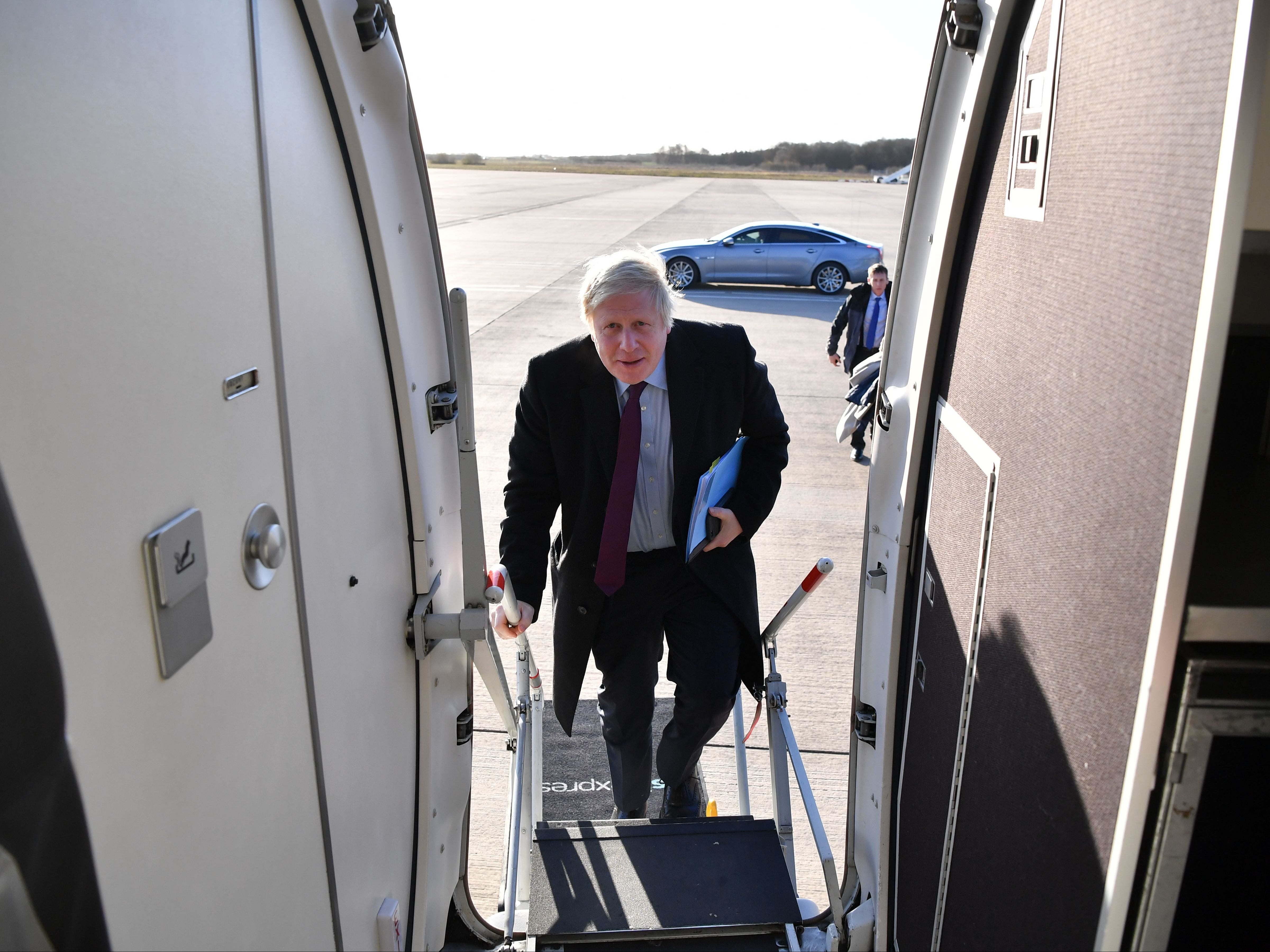 Boris Johnson will board a plane to Brussels on Wednesday afternoon