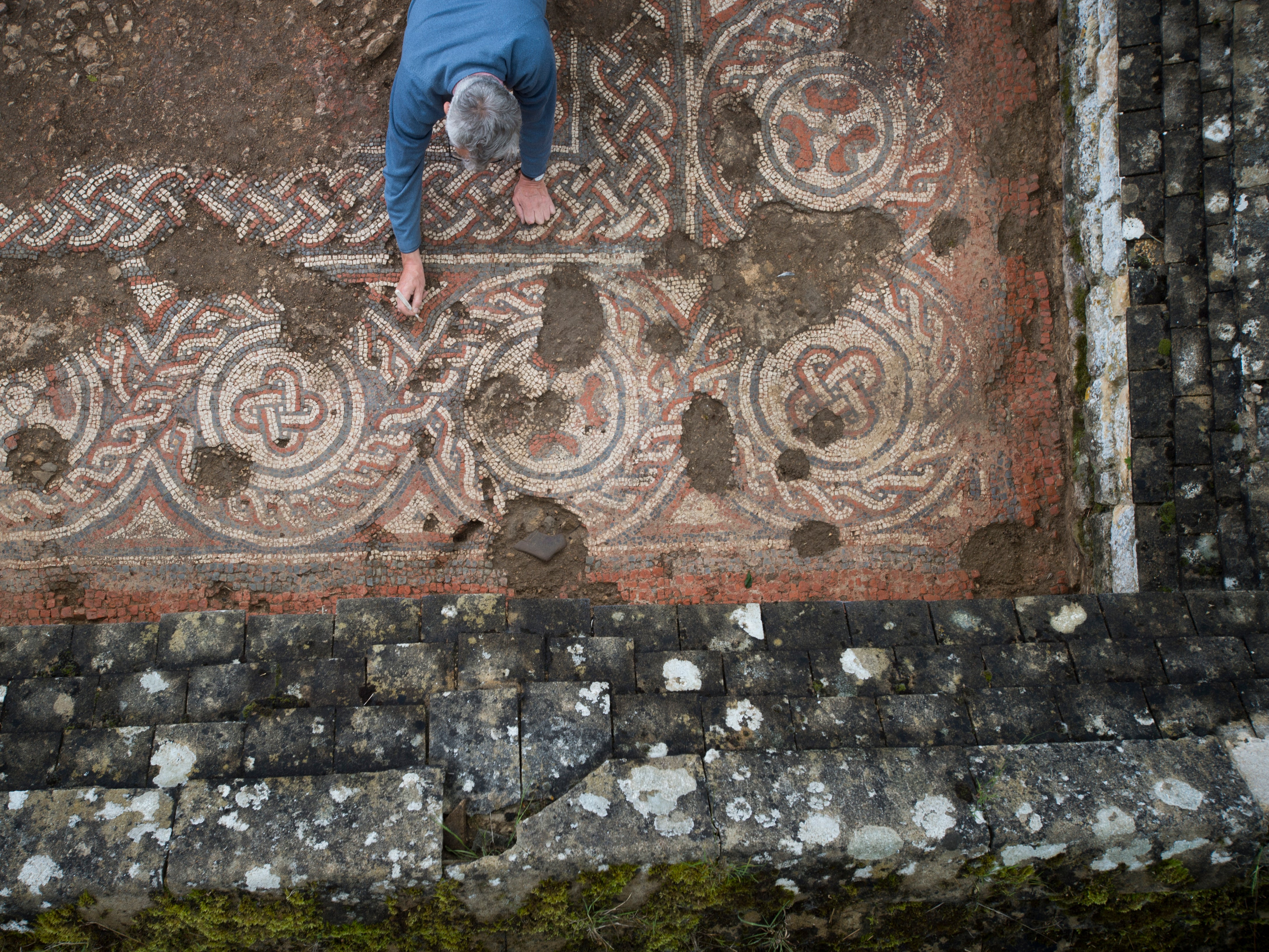 National Trust archaeologists & volunteers digging in the northern wing of the villa