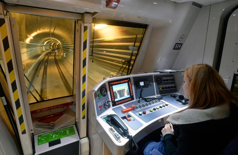 A driver in the cockpit of one of Budapest Metro’s line M4 automatic trains