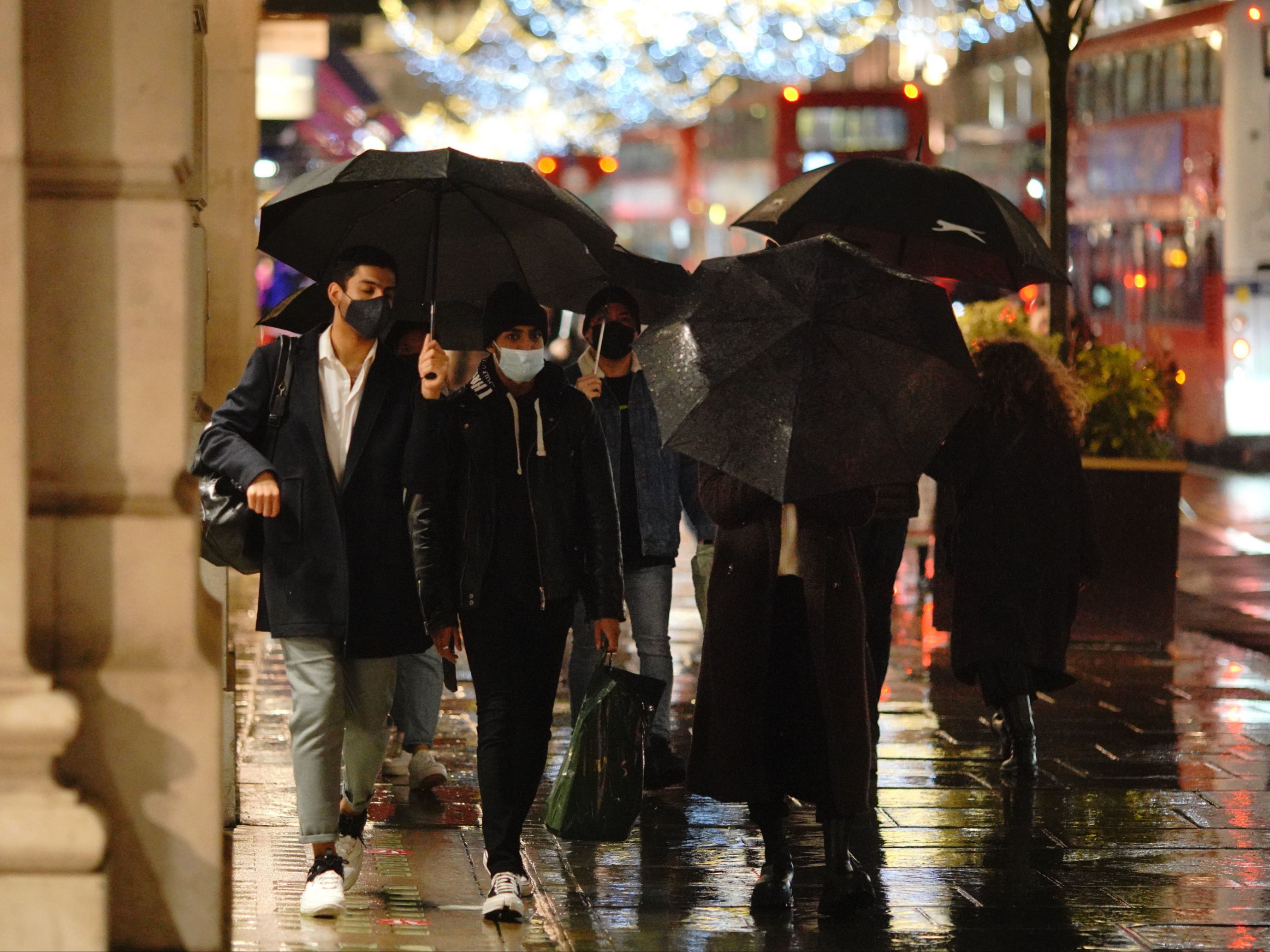 Shoppers in the West End of London, which will move into the highest tier of restrictions from Wednesday