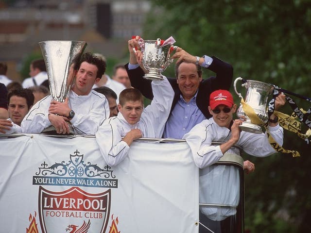 <p>Robbie Fowler, Steven Gerrard, Gerard Houllier and Sami Hyypia parade Liverpool’s trophies in 2001</p>