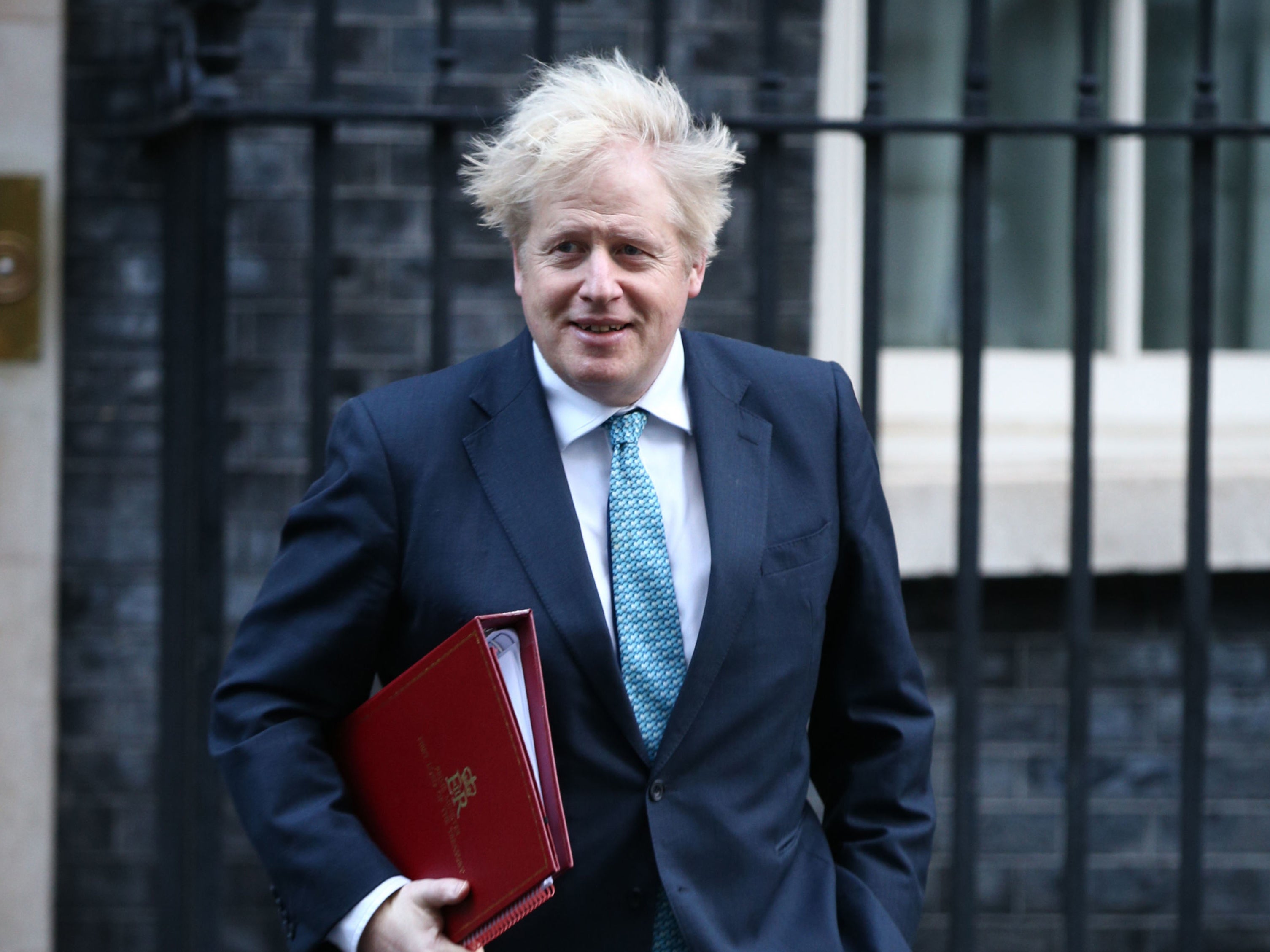 Boris Johnson resists pressure to scrap easing of Christmas rules