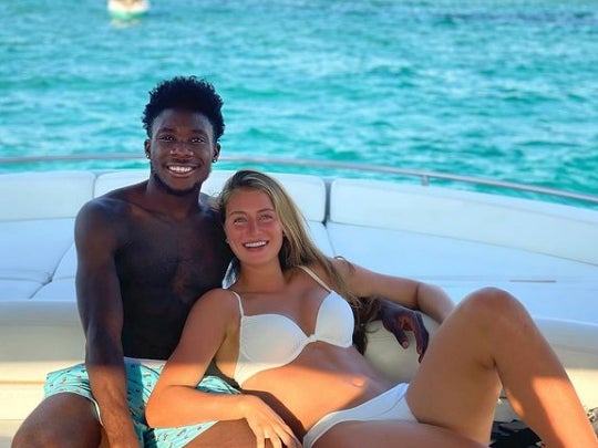 Alphonso Davies was on holiday in Ibiza with his girlfriend Jordyn Huitema