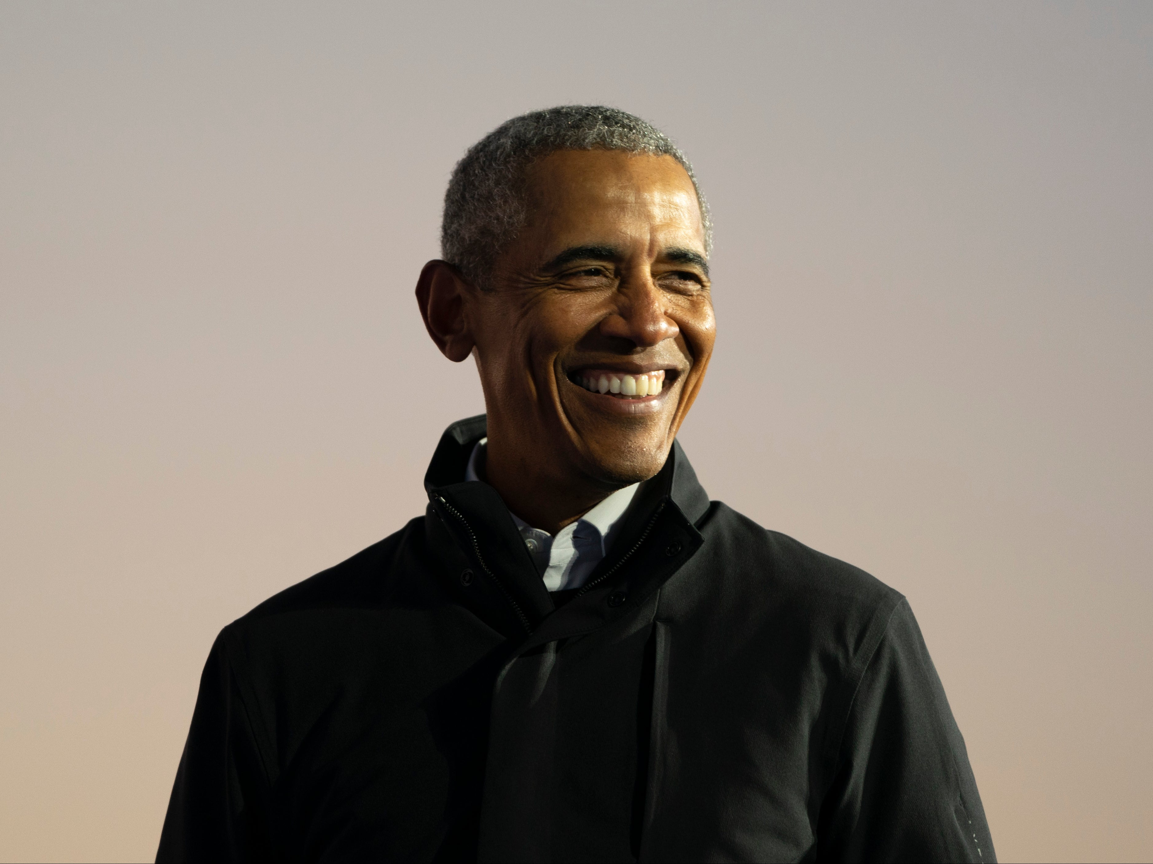 Barack Obama speaks during a drive-in campaign rally with Joe Biden on 31 October 2020 in Detroit, Michigan