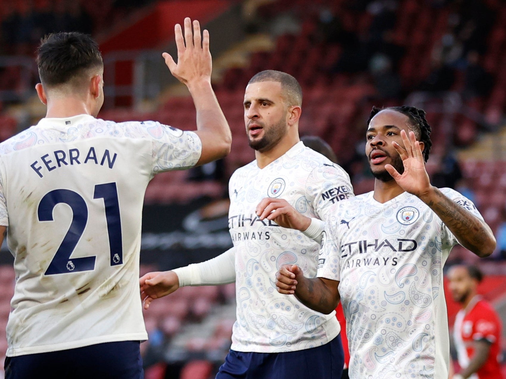 Raheem Sterling celebrates after putting Manchester City in front of Southampton