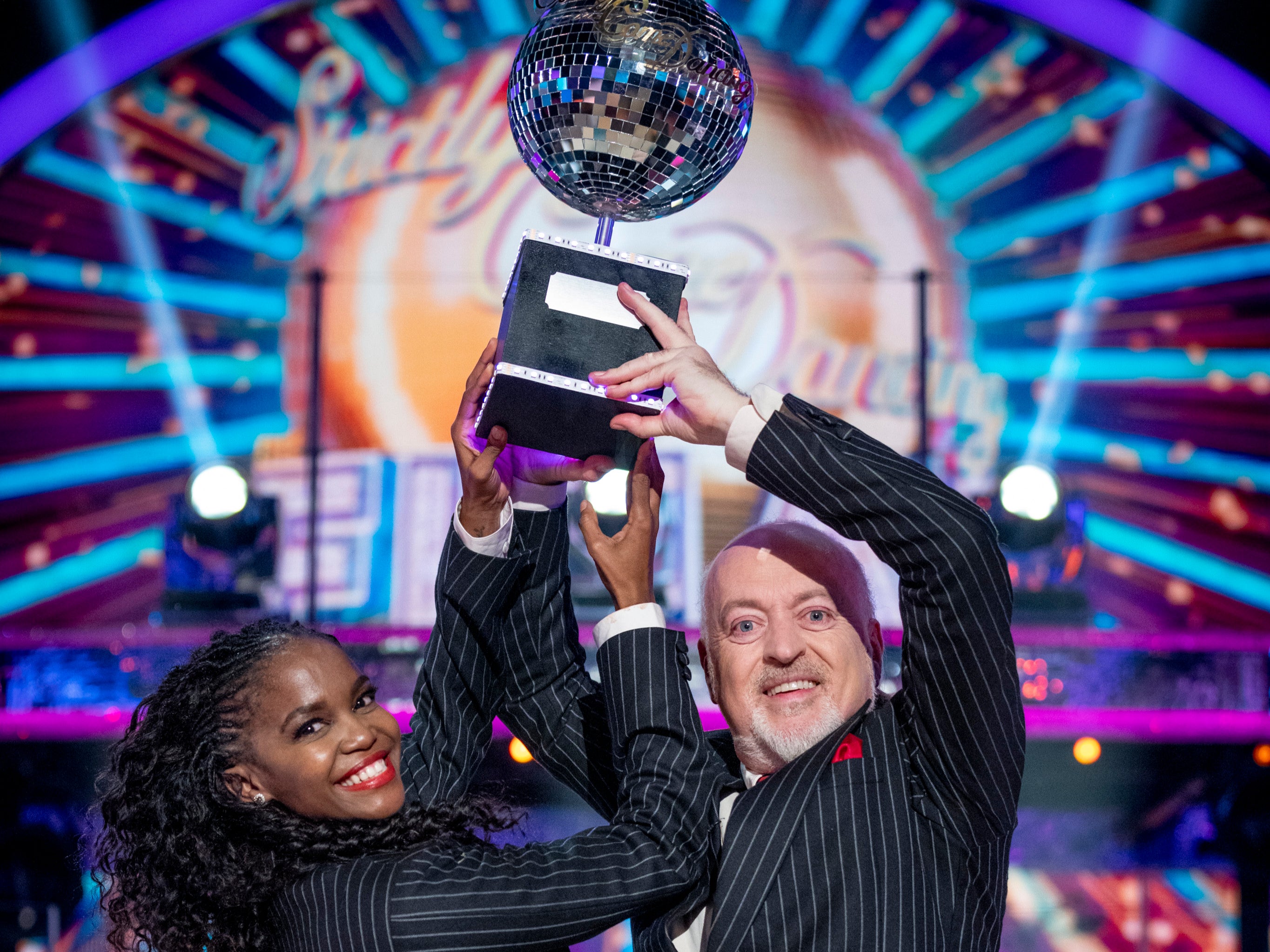 Bailey and Oti Mabuse holding aloft the ‘Strictly’ Glitterball trophy