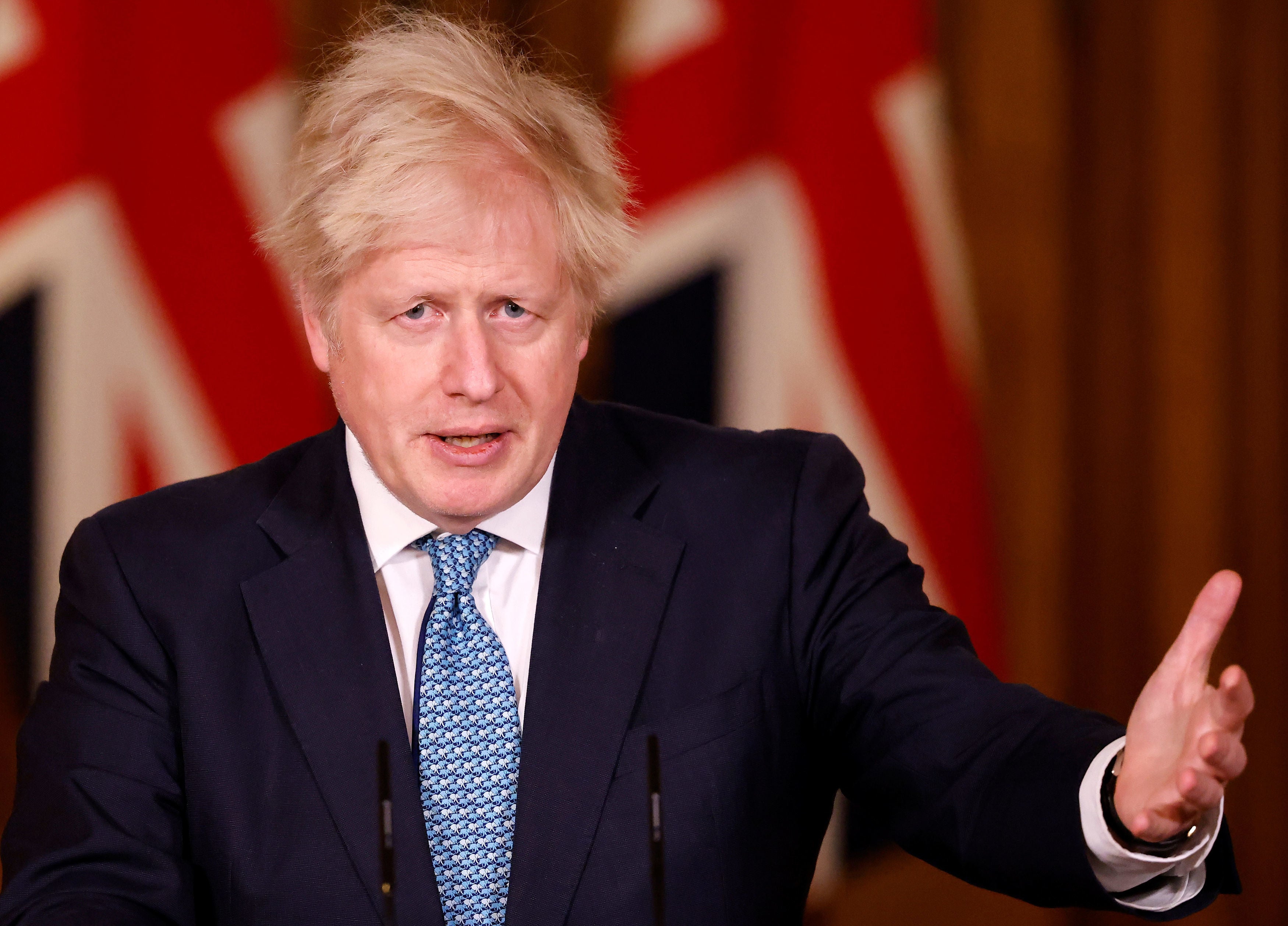 Boris Johnson leading a media briefing in Downing Street on Monday