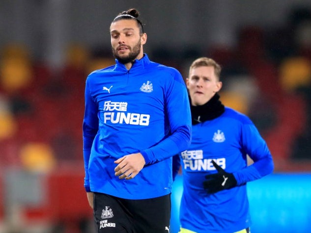 Andy Carroll warming up for Newcastle during his second spell at the club