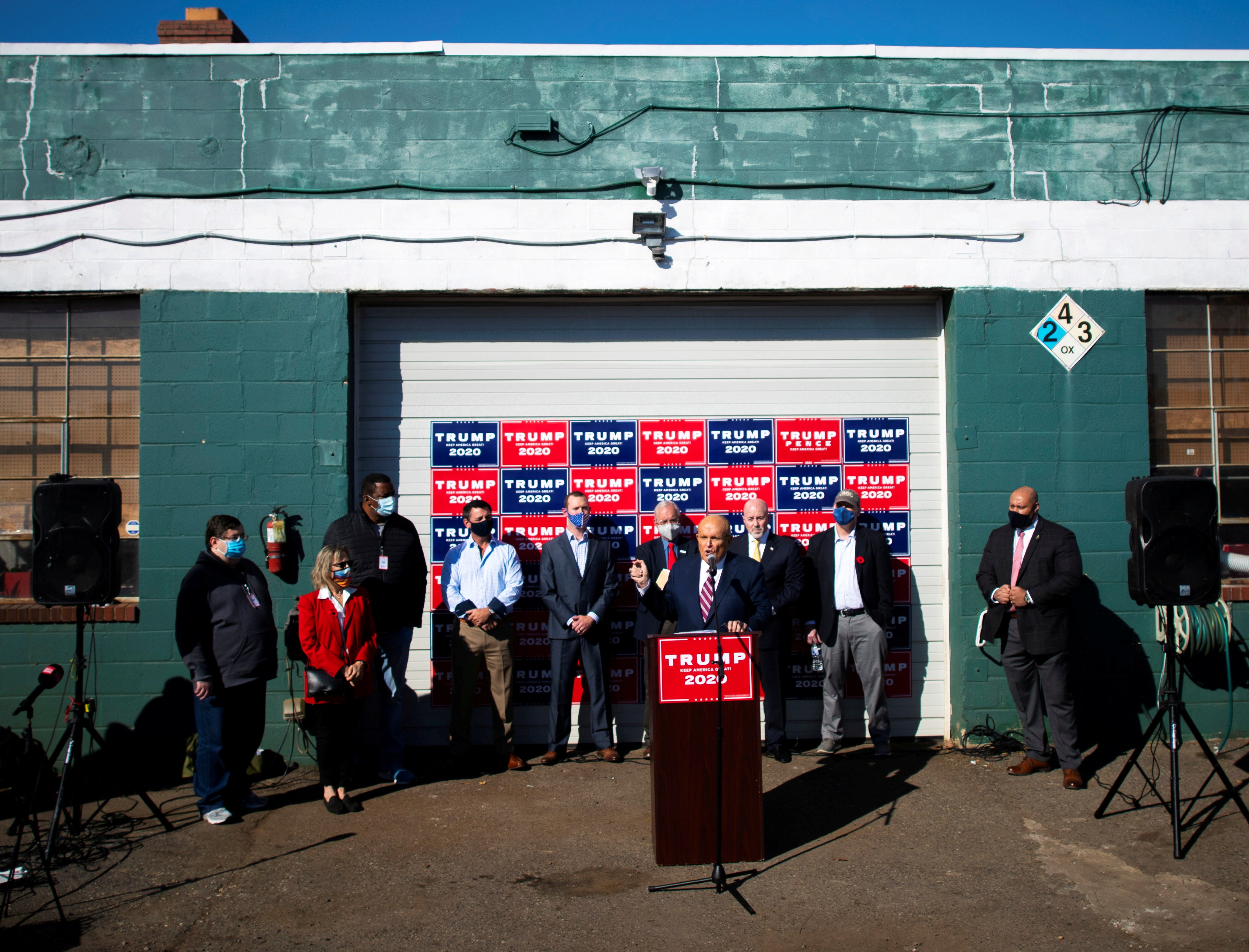 Former New York Mayor Rudy Giuliani addresses the media with the Trump legal team after news media named Democratic presidential nominee Joe Biden the winner in the 2020 U.S. presidential election, at Four Seasons Landscaping company in Philadelphia, Pennsylvania, U.S. November 7, 2020.