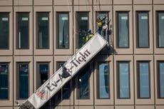 Baltimore building explosion injures 23, traps workers