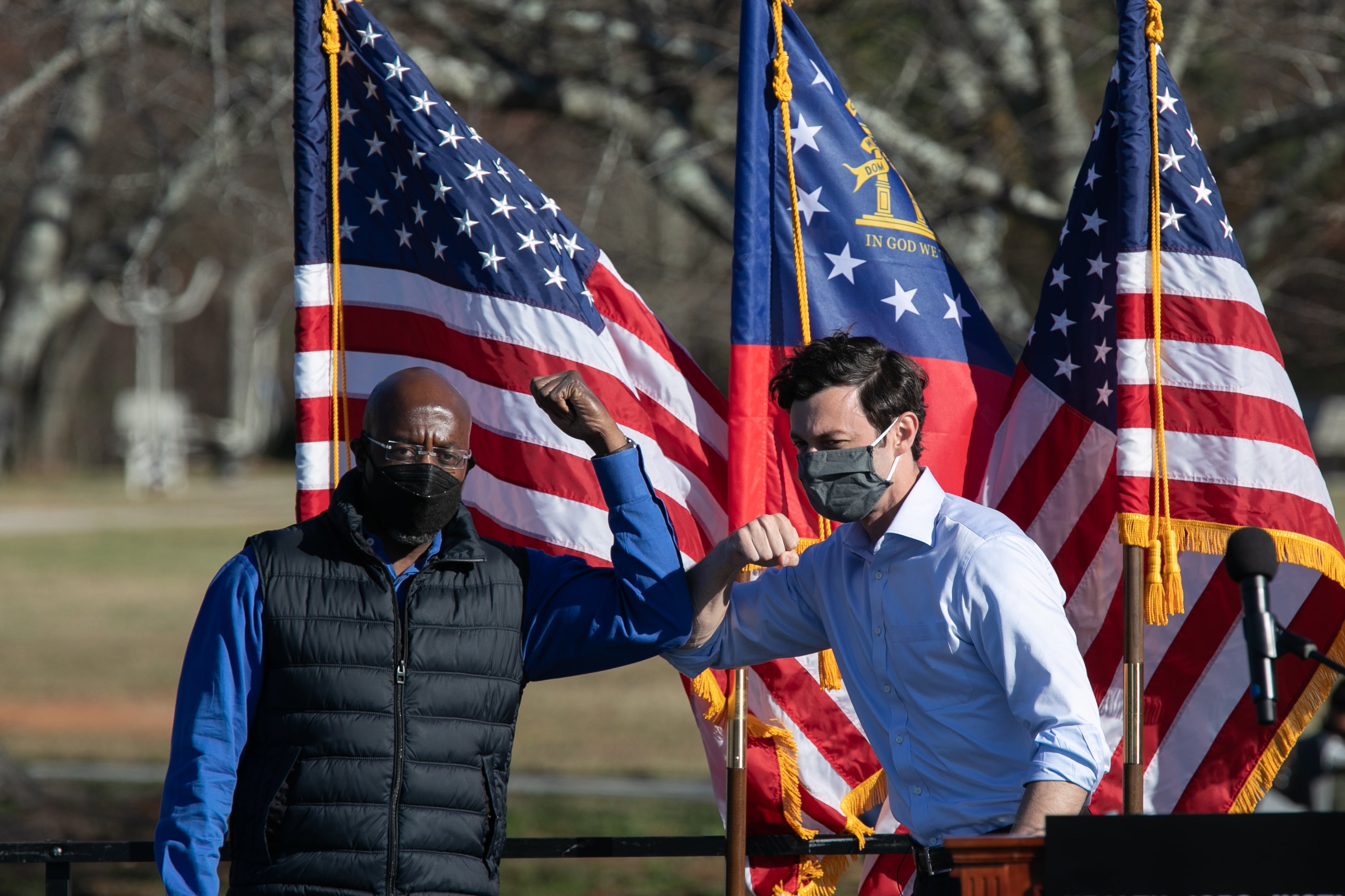 Georgia Senate candidates Raphael Warnock, left, and Jon Ossoff, right, have gotten a campaign boost from an unlikely source: Donald Trump.