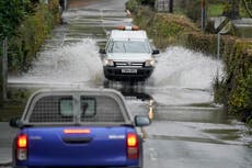 100 flood warnings in force as heavy rain batters the UK