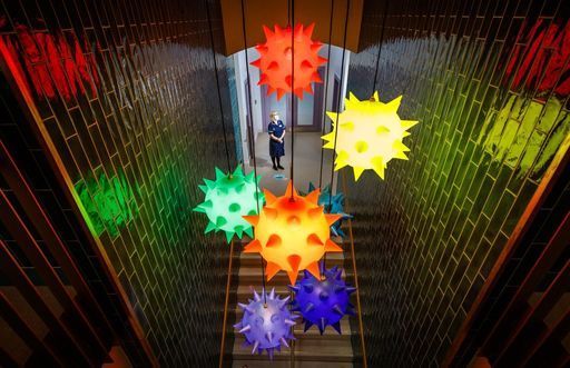 Ward manager Sue Peak views an art installation titled 'Over the Rainbow' that celebrates NHS workers who have fought the pandemic, and forms part of the recently completed four-million-pound redevelopment at the Thackray Museum of Medicine in Leeds.