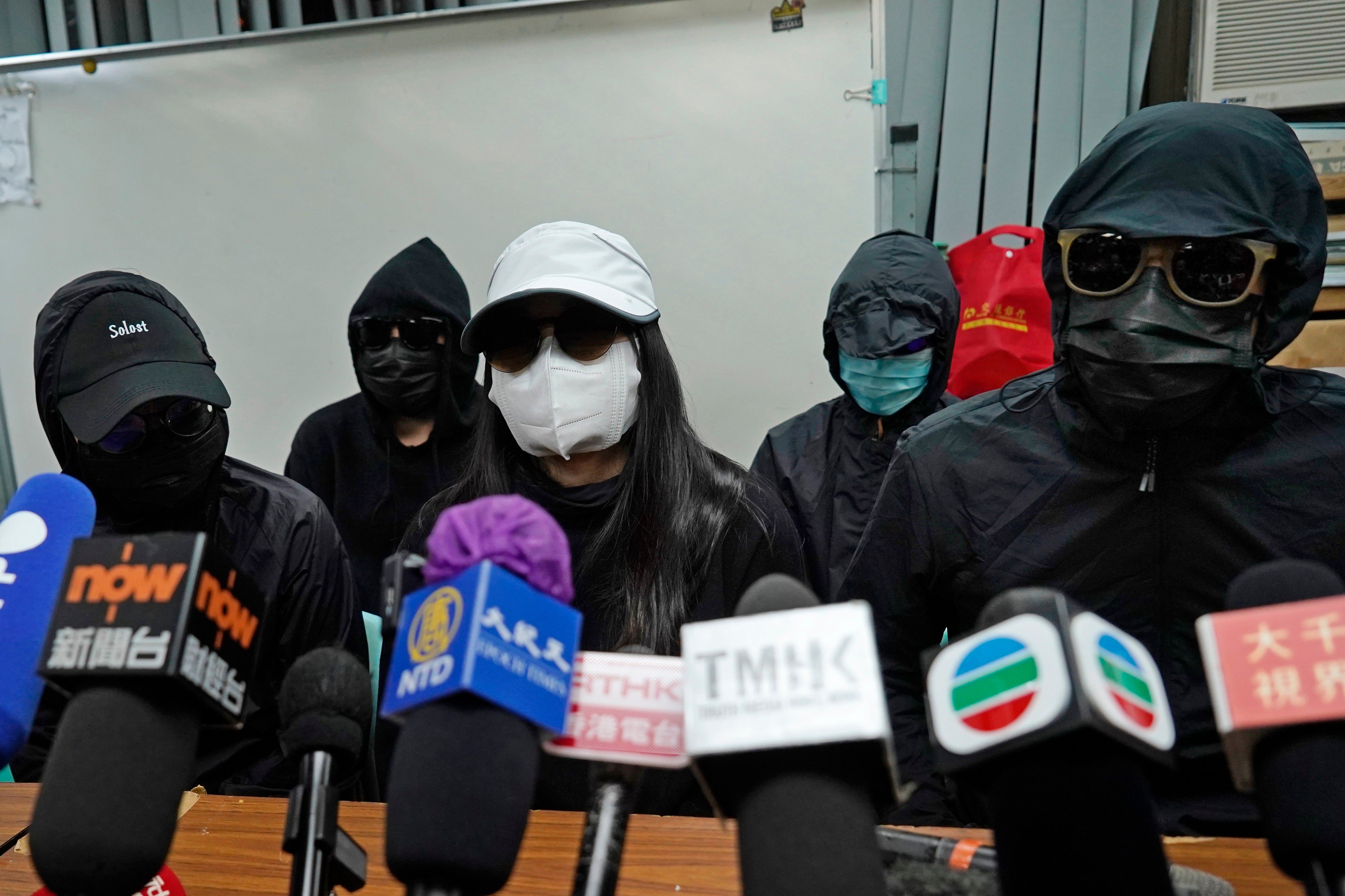 File image: Relatives of the 12 activists facing trial in China