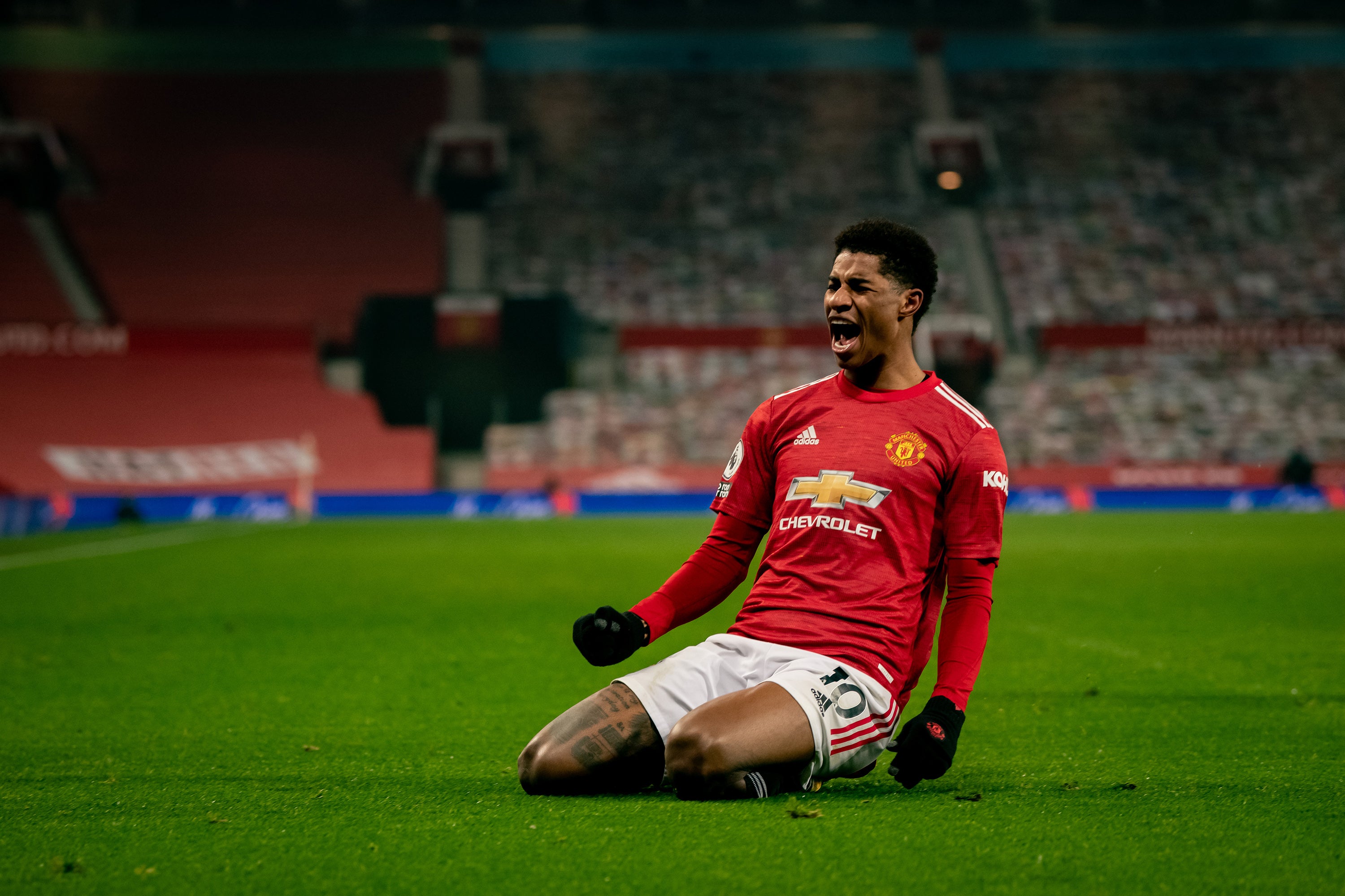 Marcus Rashford celebrates his goal against Wolves