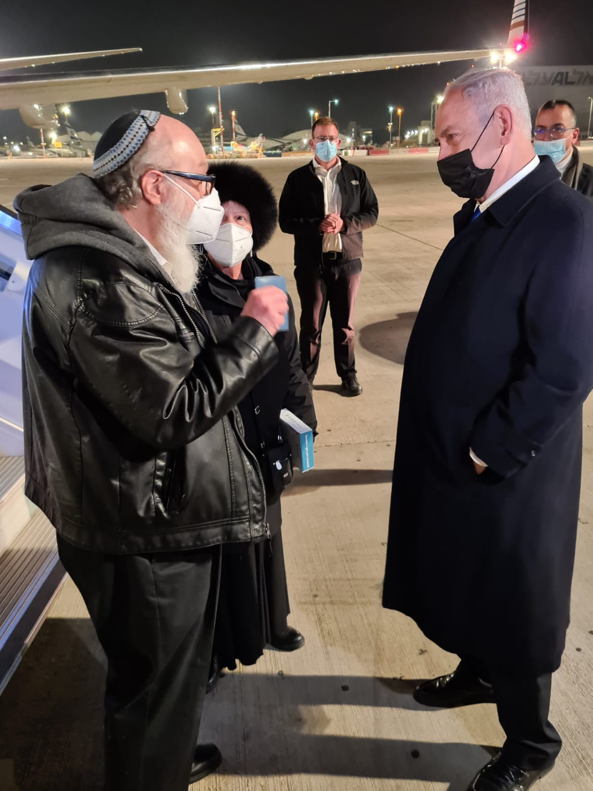 Jonathan and Esther Pollard are greeted by the Israeli PM Benjamin Netanyahu at Tel Aviv airport on Wednesday morning