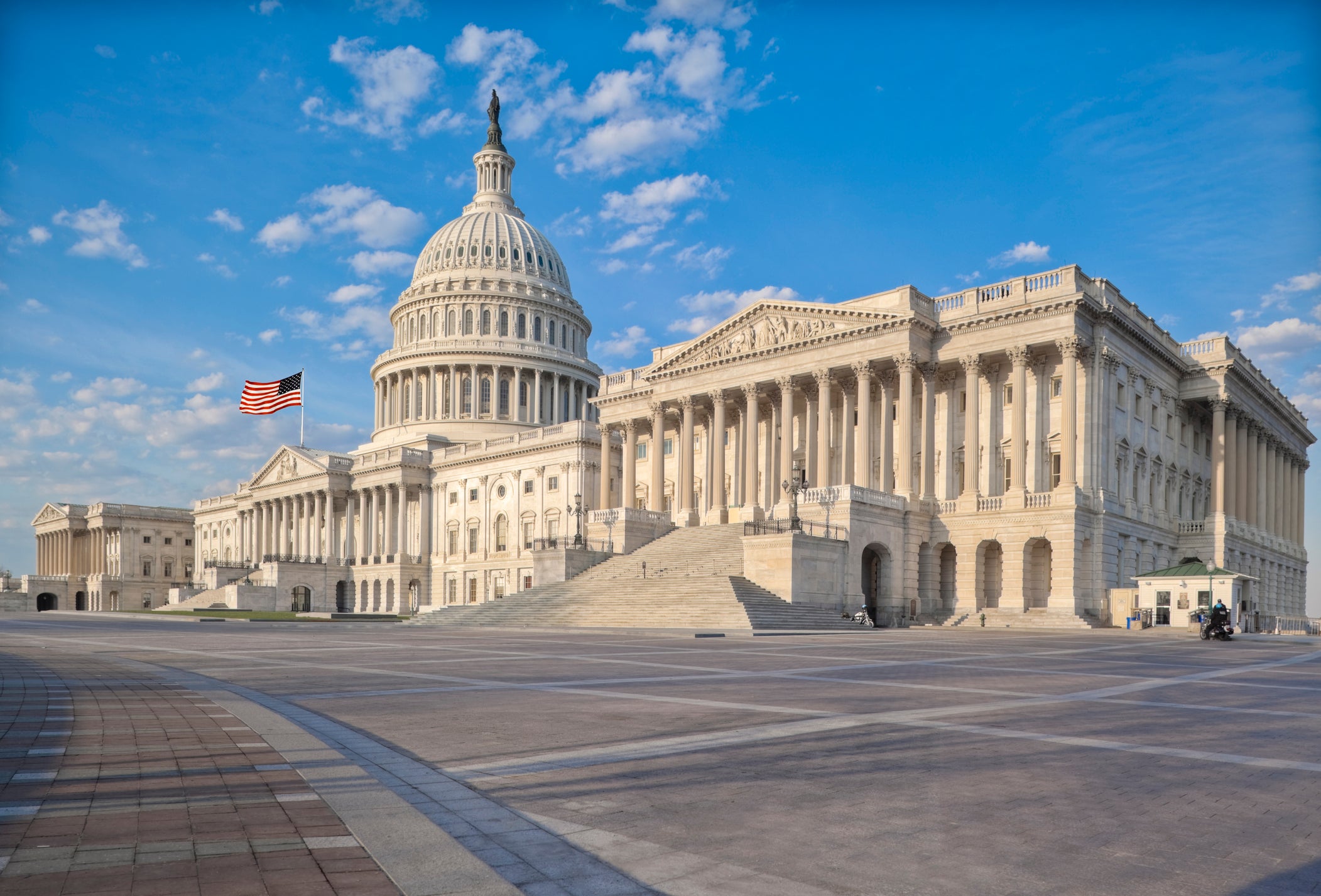 The east side of the US Capitol in the early morning. Senate Chamber in the foreground.