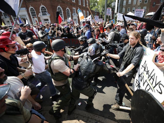 <p>White nationalists, neo-Nazis and members of the alt-right clash with counter-protesters in Virginia</p>