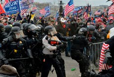 Pro-Trump mob forces way into Capitol as president fans flames 