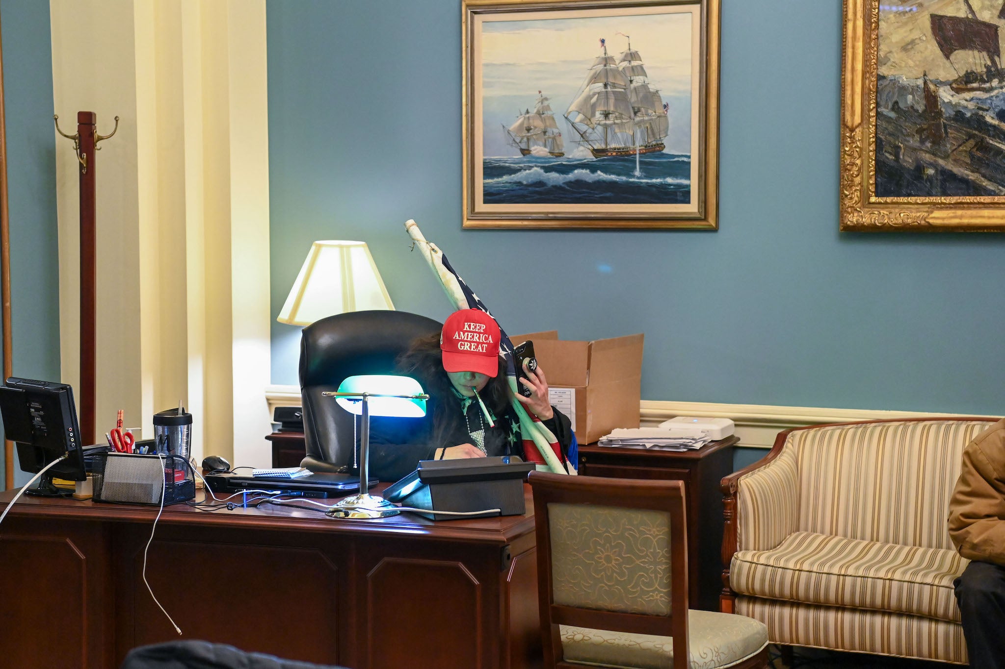 A Trump supporter inside the office of Speaker of the House Nancy Pelosi