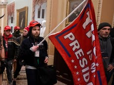 Rioter fired after storming US Capitol while wearing work name tag