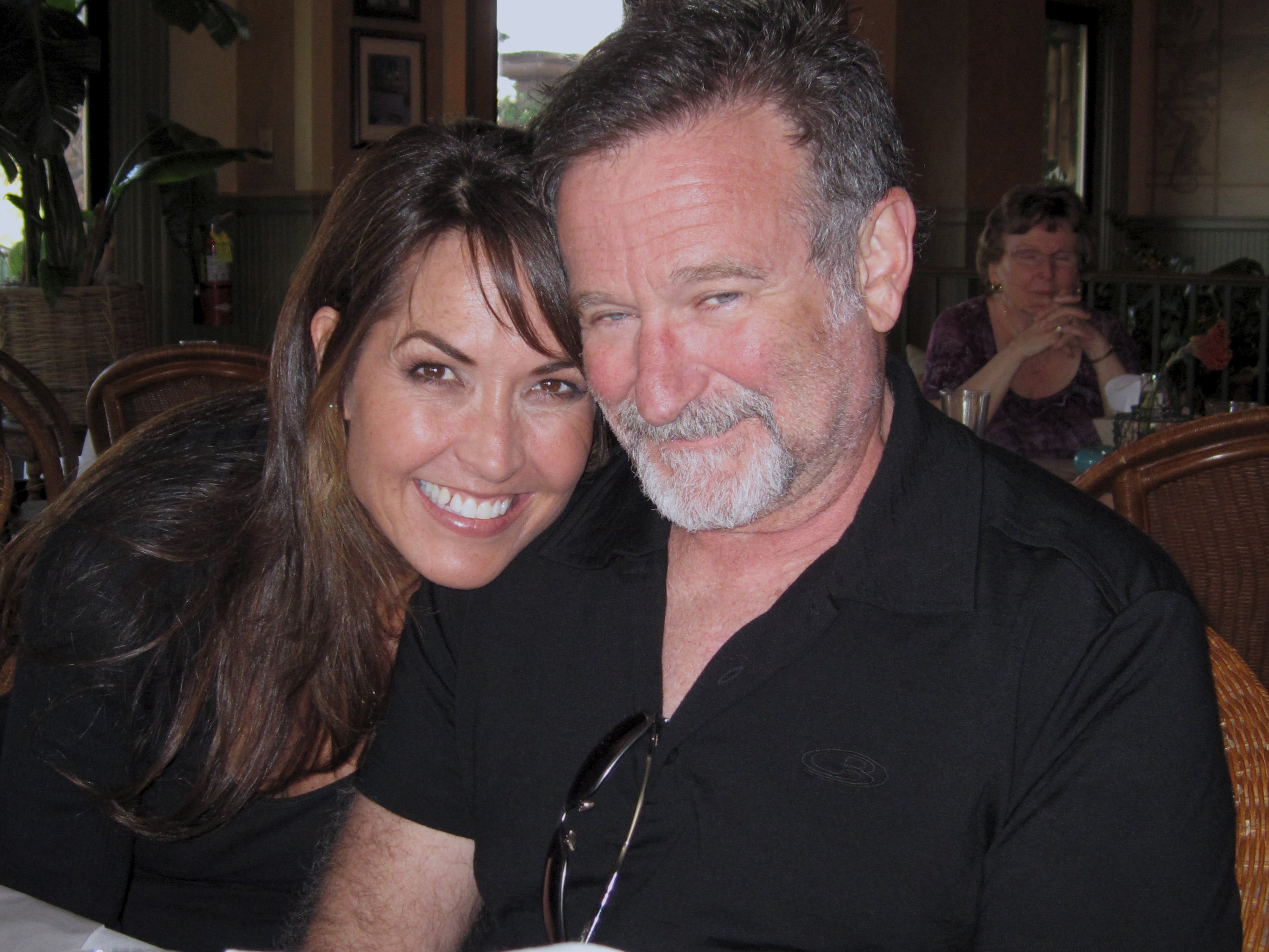 The late comedian Robin Williams and his wife, Susan Schneider Williams, who now works to spread awareness of Lewy body dementia