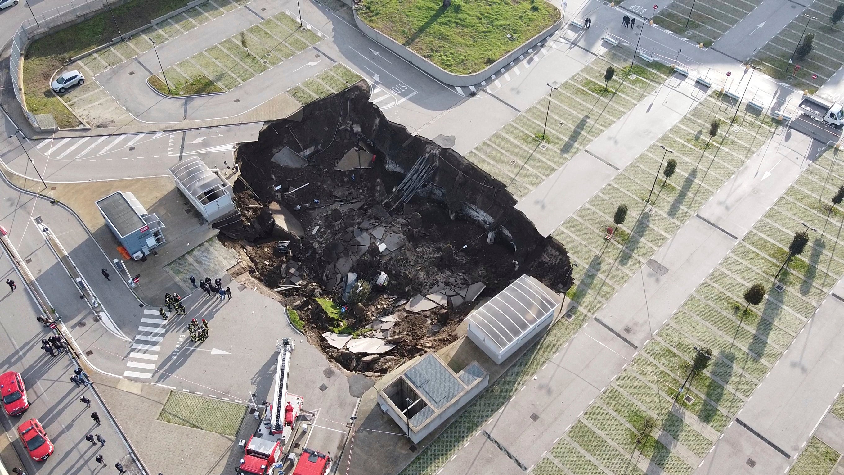 A view of the large sinkhole that opened overnight in the parking of Ospedale del Mare hospital in Naples, Italy, Friday, Jan. 8, 2021.&nbsp;