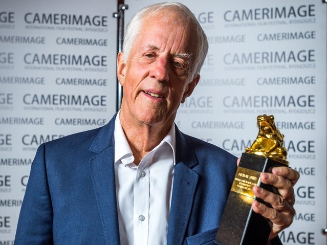 Michael Apted receiving the award for lifetime achievement during a gala closing of the 24th Festival of the Art of Cinematography Camerimage at the Opera Nova in Bydgoszcz, Poland