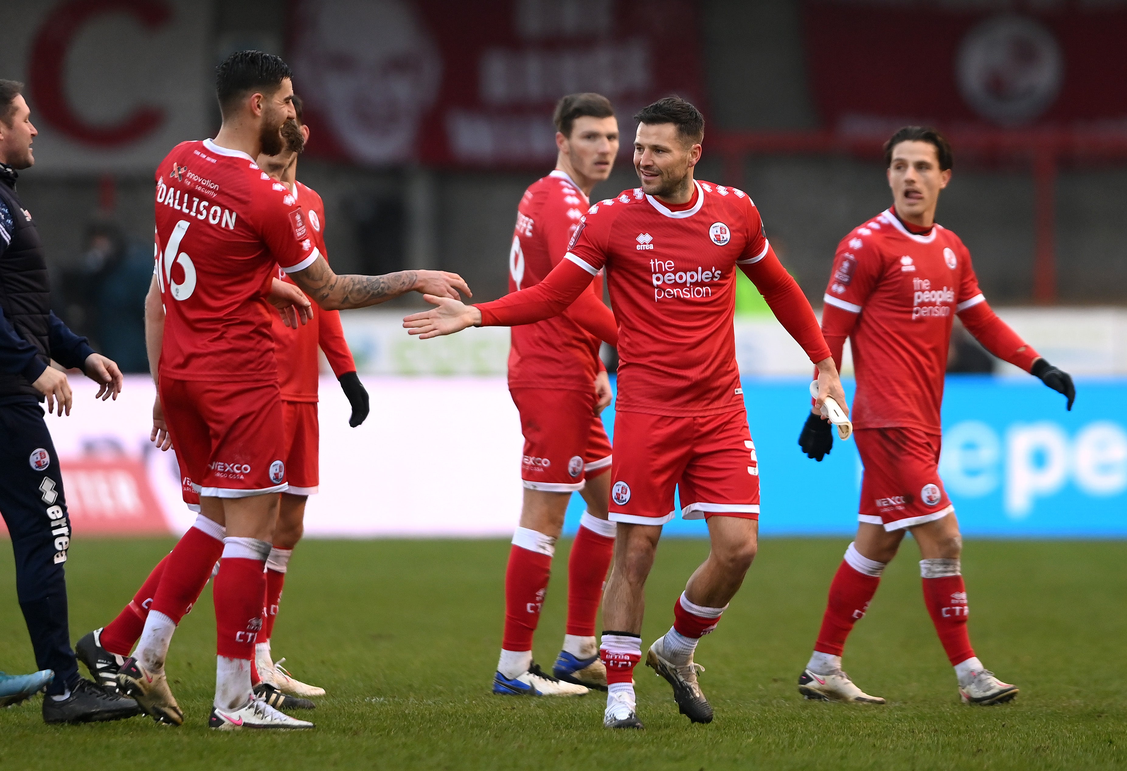 Crawley Town players celebrate their victory