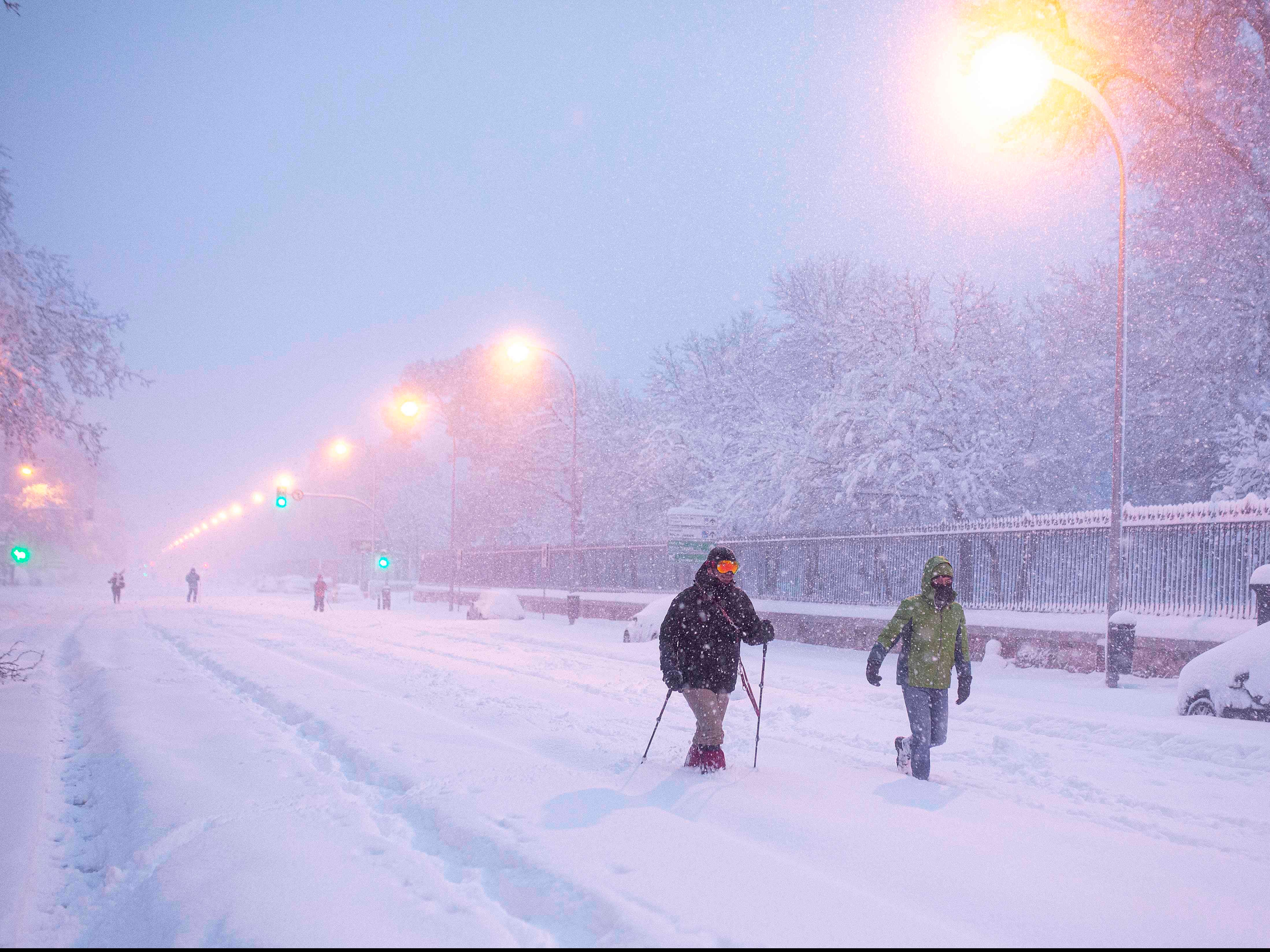Hospital staff trek 20km to work after snowstorm hits Spain