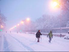 Hospital staff trek 20km to work after snowstorm hits Spain