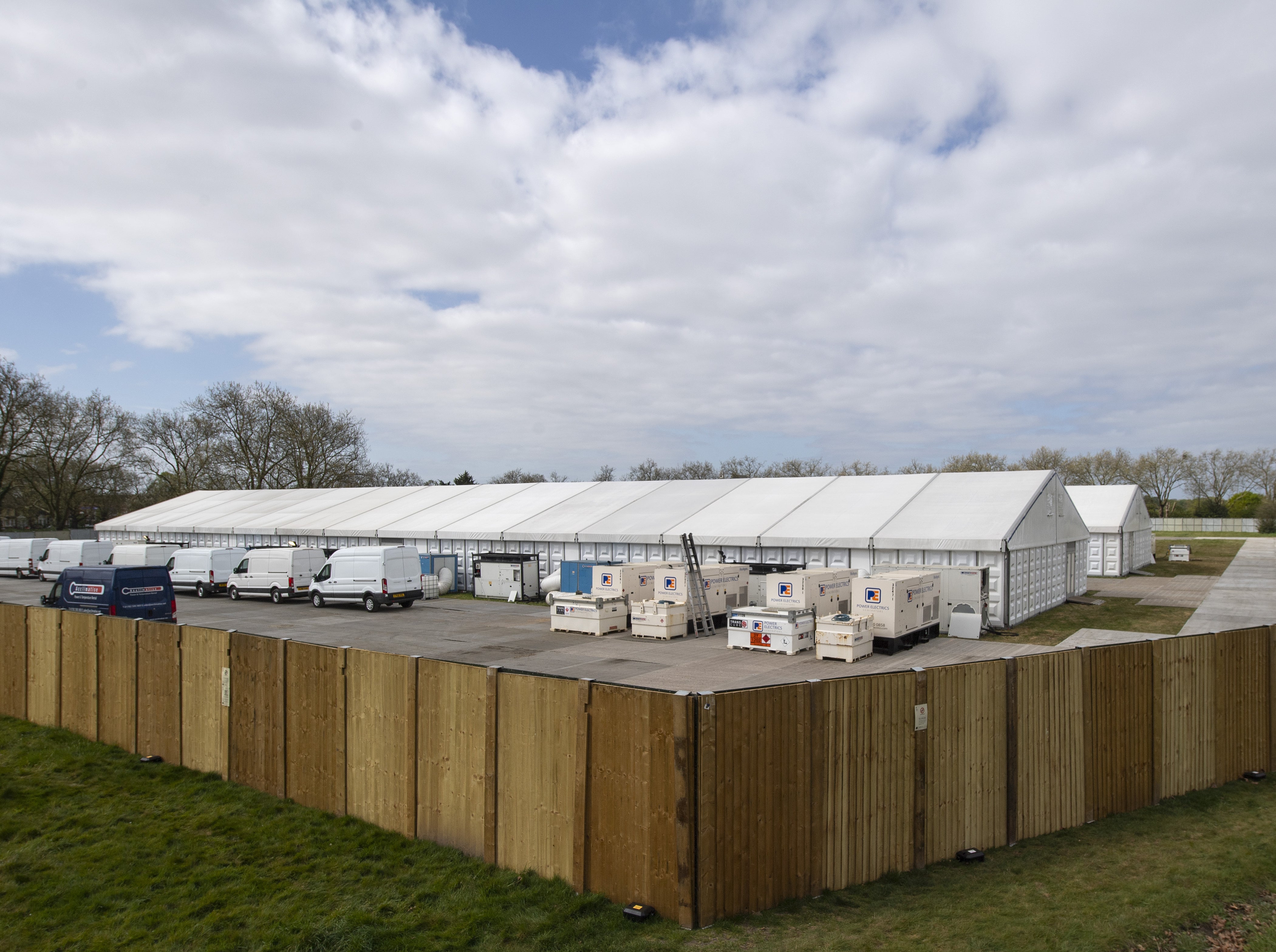 Temporary mortuaries were first rolled out across the UK in areas like Wanstead Flats, London (pictured) to alleviate hospital morgues that had reached capacity