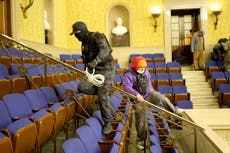 Trump rioter in full body armour broke into Capitol with his mother