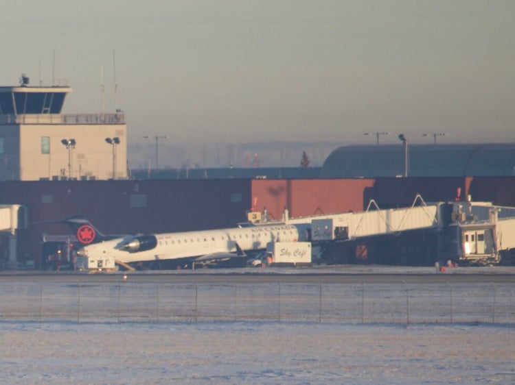 The Air Canada plane’s nose tipped upwards