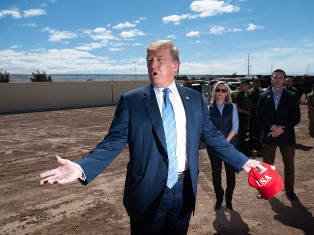 <p>Homeland security Kirstjen Nielsen watches a Trump address on the border</p>