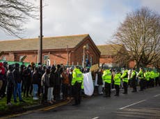 Asylum seekers protest conditions in military camp