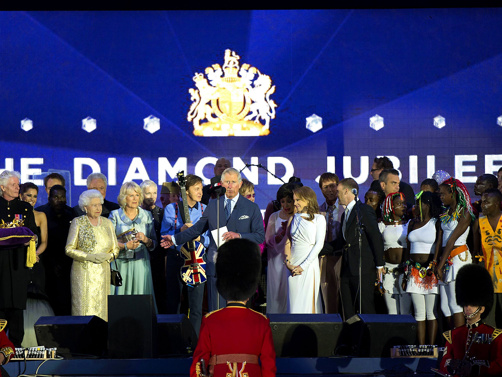 The Queen is joined on stage by musicians including Sir Paul McCartney at her 2012 Diamond Jubilee concert at Buckingham Palace